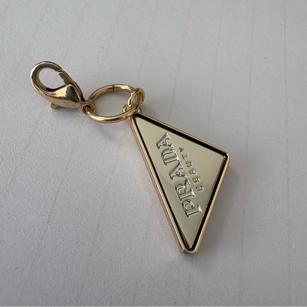 Prada Gold Triangle Logo Charm with Cream Enamel - Picture 9 of 9